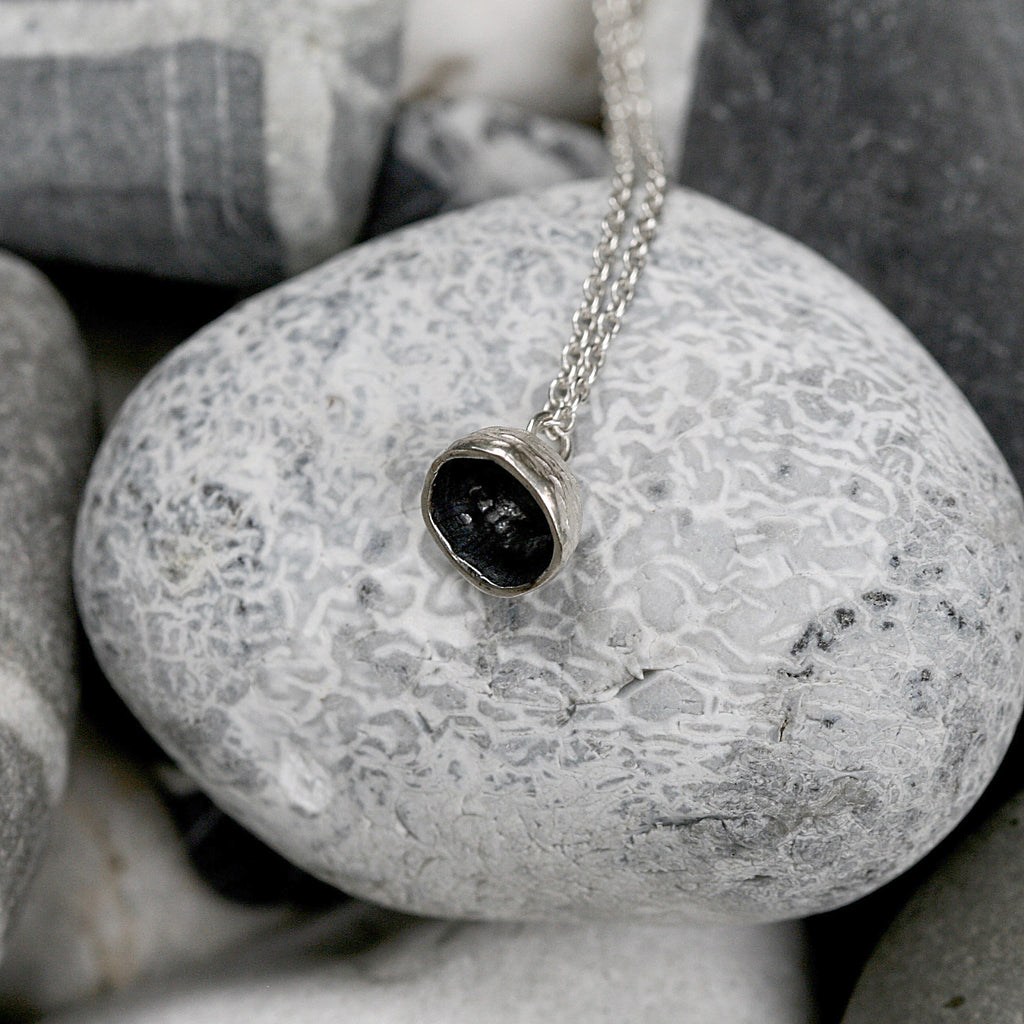 Small acorn necklace handmade in Sterling silver and available in polished silver, oxidised silver or with touches of 22ct gold vermeil plate. Part of my Acorn Cups collection. On an 18 inch fine 40 trace silver chain with a sprung bolt catch.