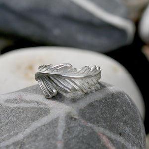 A carved fern frond on a simple band. Handmade in hallmarked Sterling silver. A lovely slim ring that sits well with any number of stackable others. Available in any size. Ring jewellery inspired by nature.