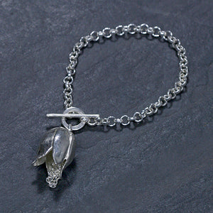 A hallmarked Sterling silver single fritillaria lily bracelet on a 7.5 inch Sterling silver belcher chain with a handmade catch. Statement floral jewellery by Sally Wilcox UK.